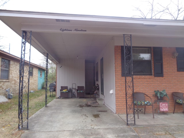 exterior space featuring a carport