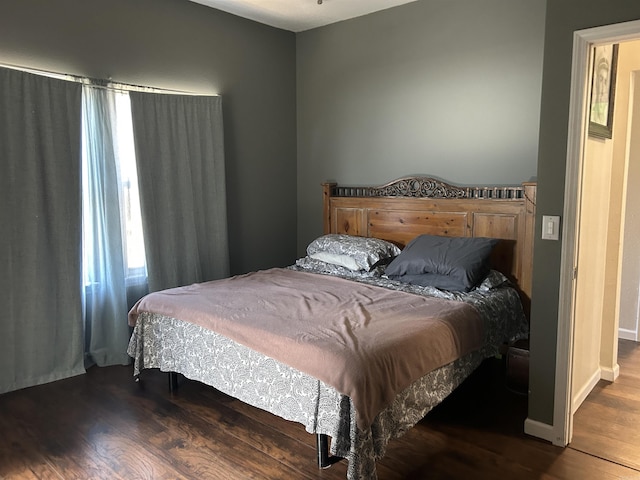 bedroom featuring hardwood / wood-style floors