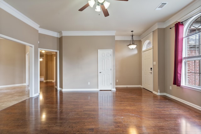 interior space featuring ornamental molding and a wealth of natural light