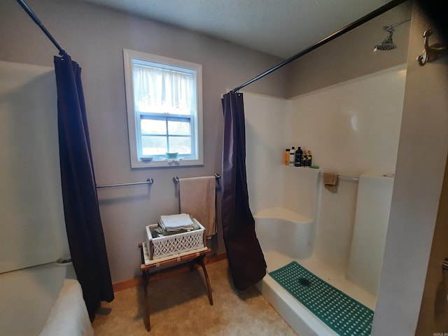 bathroom with a shower with shower curtain