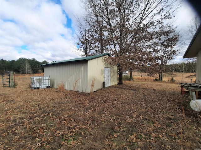 view of outdoor structure featuring a rural view