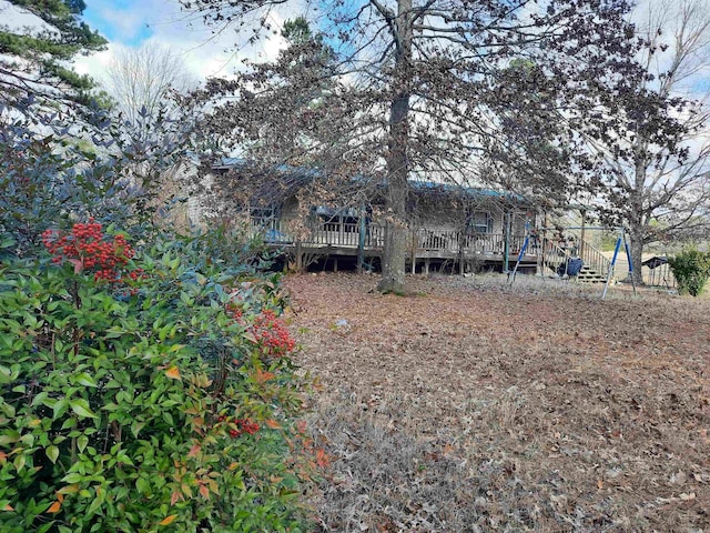 view of yard featuring a deck