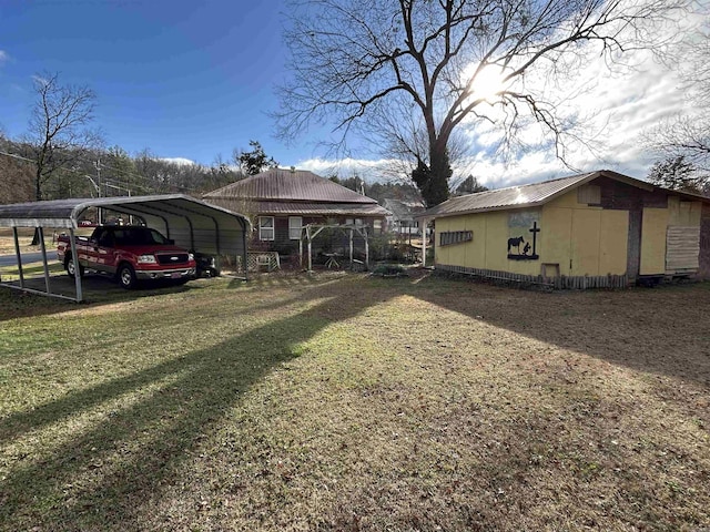 view of yard with a carport