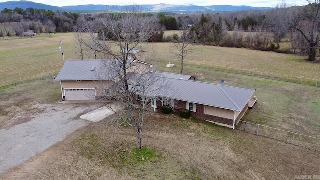 birds eye view of property with a mountain view