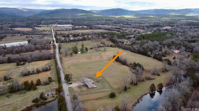 bird's eye view with a water and mountain view and a rural view