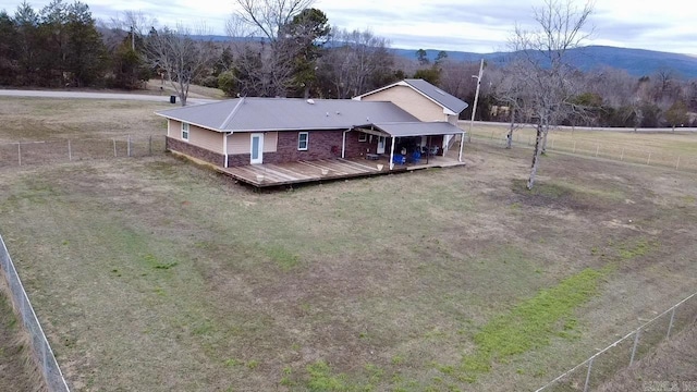 birds eye view of property featuring a mountain view and a rural view