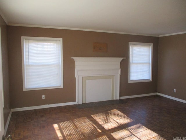 unfurnished living room featuring dark parquet flooring and ornamental molding