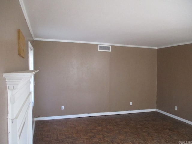 interior space with dark parquet floors and ornamental molding