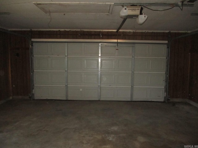 garage featuring a garage door opener