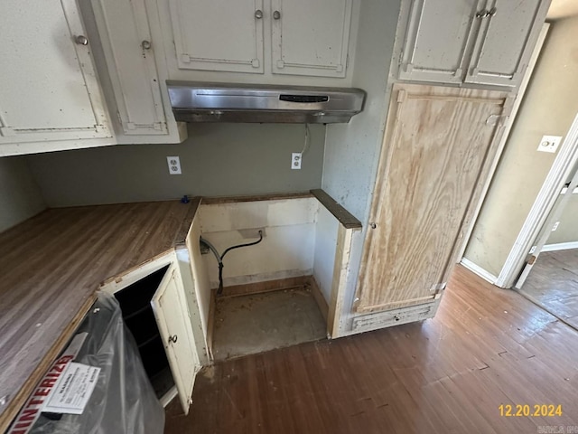 25 Fairview Dr, Mcgehee, AR 71654 - kitchen with dark wood finished floors and baseboards