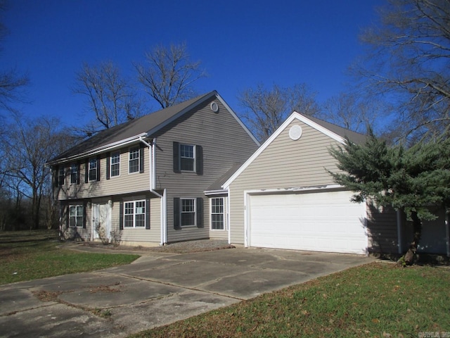 colonial-style house featuring a garage