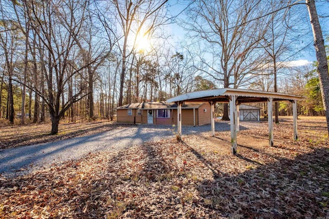 exterior space with a carport