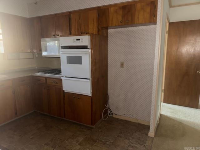 kitchen featuring white appliances