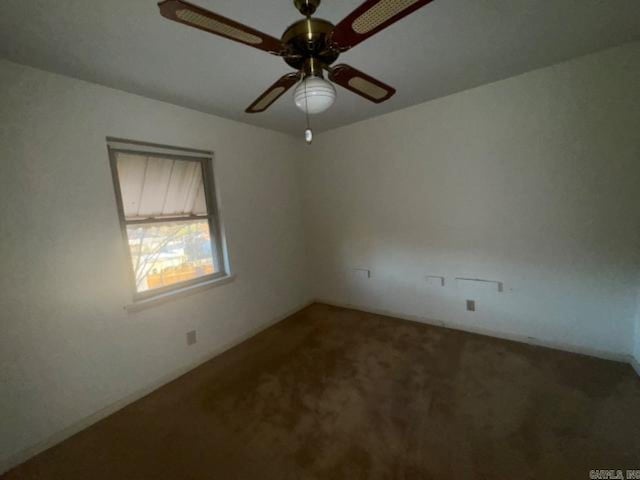 spare room with ceiling fan