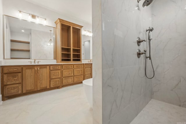 bathroom featuring vanity and independent shower and bath