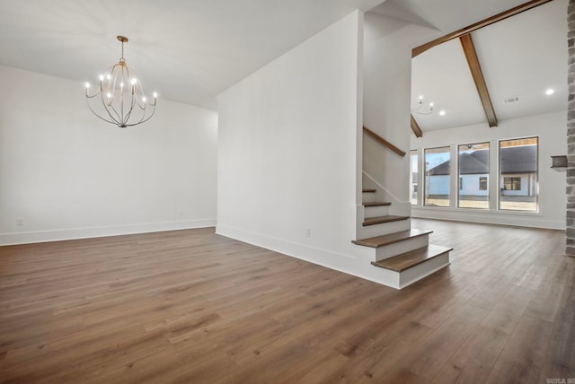 interior space featuring beam ceiling, dark hardwood / wood-style flooring, high vaulted ceiling, and an inviting chandelier