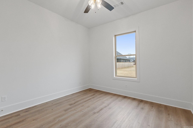 unfurnished room featuring ceiling fan and light hardwood / wood-style flooring