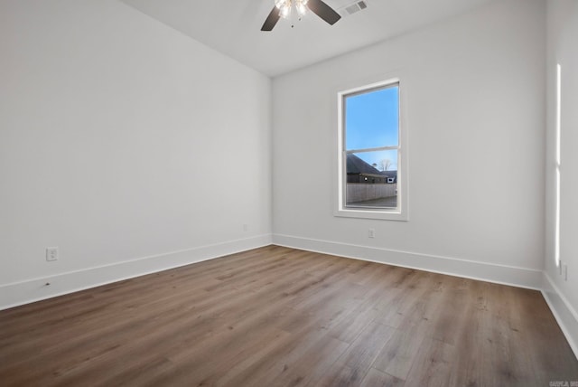 unfurnished room featuring hardwood / wood-style flooring and ceiling fan