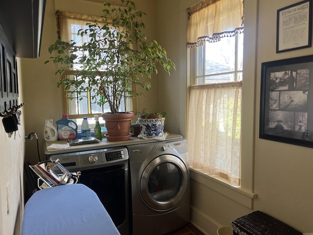 laundry room featuring washer and clothes dryer