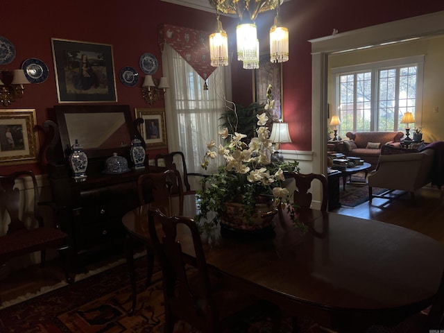 dining space featuring a notable chandelier