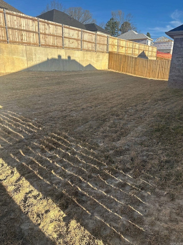 view of yard featuring fence