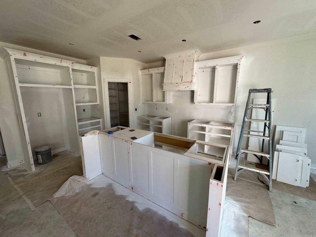 kitchen with white cabinetry