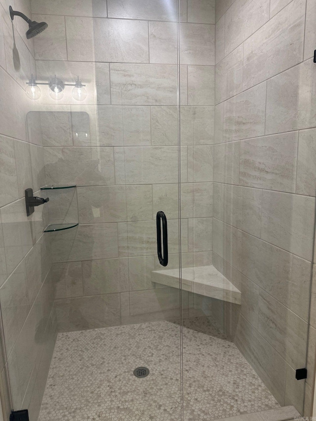 bathroom with a stall shower