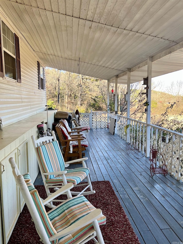 wooden deck featuring a porch