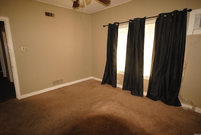 unfurnished room with carpet, ceiling fan, and a healthy amount of sunlight