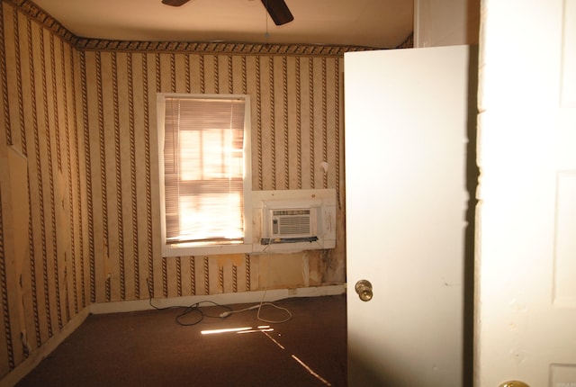 carpeted empty room with cooling unit and ceiling fan