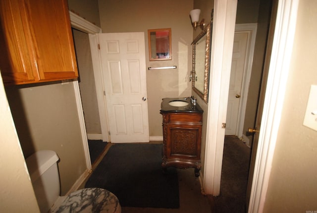 bathroom with vanity and toilet