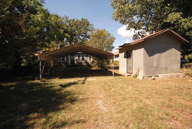 view of home's exterior featuring a carport and a lawn