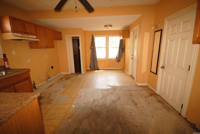 kitchen featuring ceiling fan