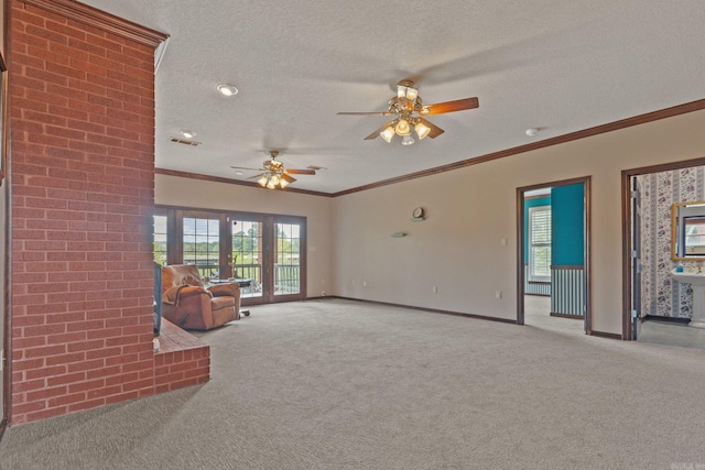 unfurnished living room with french doors, ceiling fan, ornamental molding, a textured ceiling, and light colored carpet