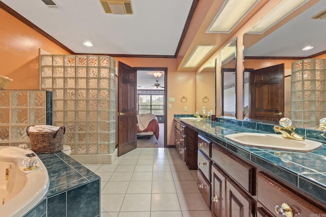 bathroom with tile patterned flooring, vanity, and ornamental molding