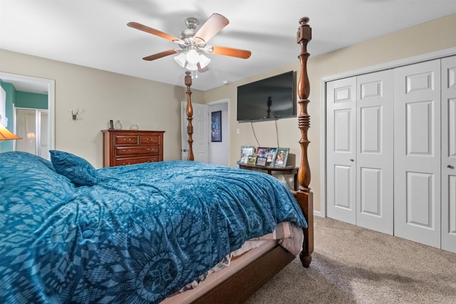 bedroom featuring ceiling fan, a closet, and carpet floors