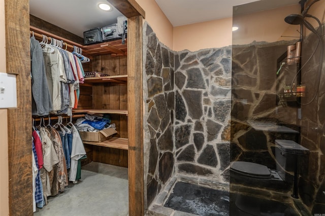 bathroom with concrete floors