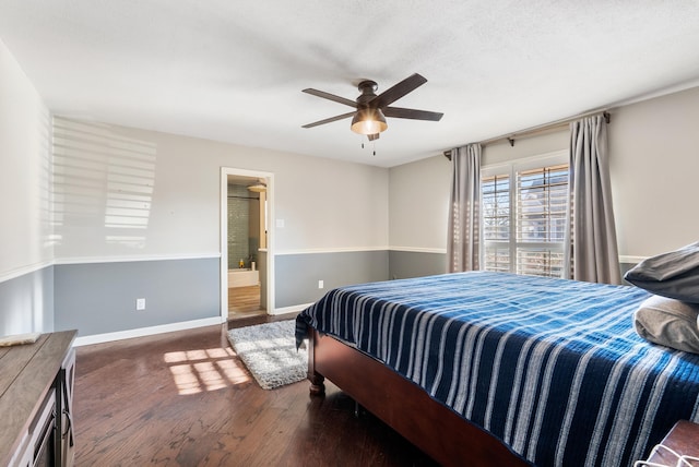 bedroom featuring a textured ceiling, connected bathroom, dark hardwood / wood-style floors, and ceiling fan