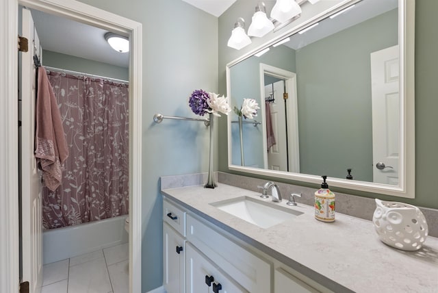 full bathroom featuring toilet, vanity, tile patterned floors, and shower / tub combo with curtain