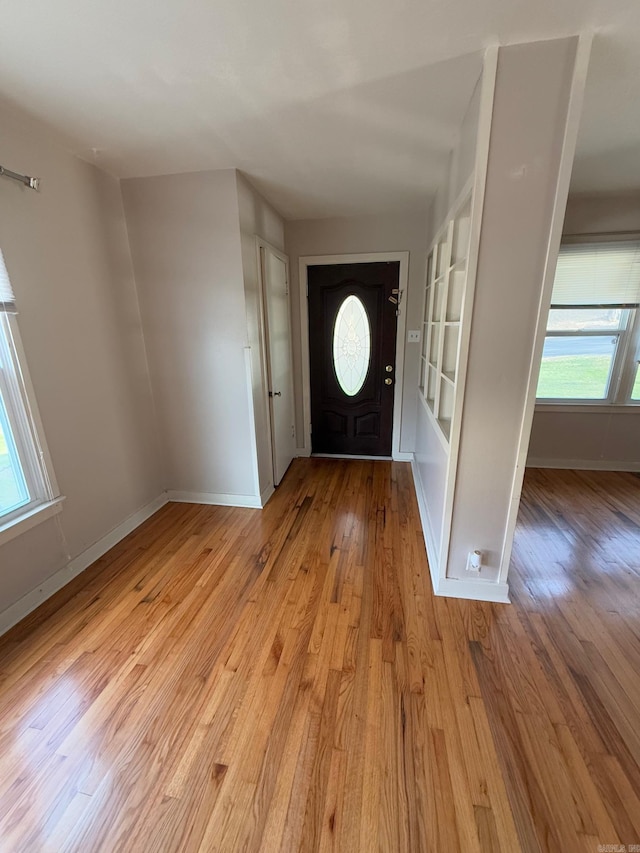 foyer with light wood-type flooring