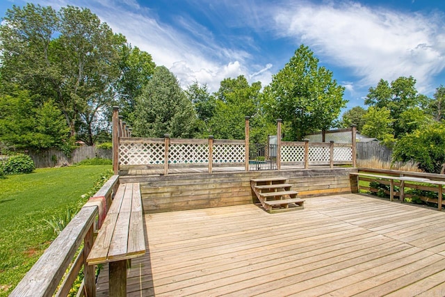 wooden terrace with a yard