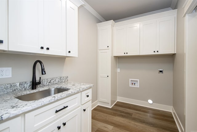 washroom featuring sink, cabinets, dark wood-type flooring, electric dryer hookup, and hookup for a washing machine