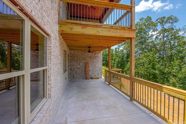 view of patio / terrace with ceiling fan and a wooden deck