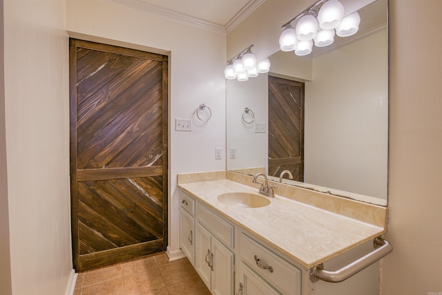 bathroom featuring tile patterned floors, vanity, and ornamental molding