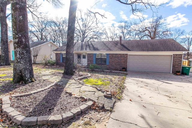 single story home featuring a garage