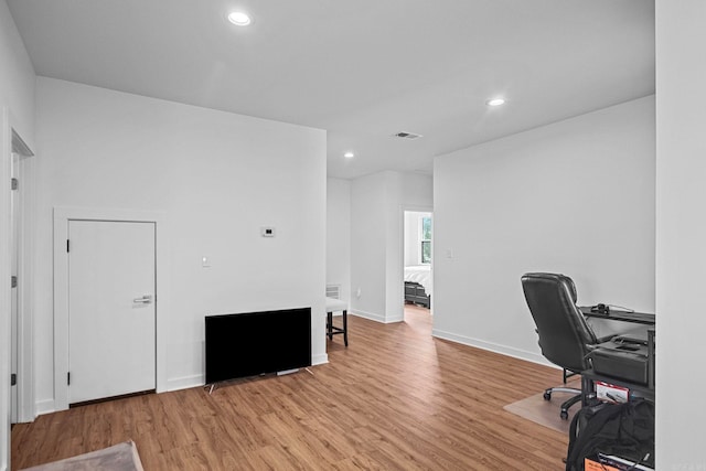 office space featuring light wood-type flooring