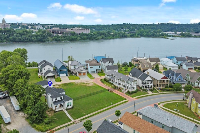 birds eye view of property featuring a water view