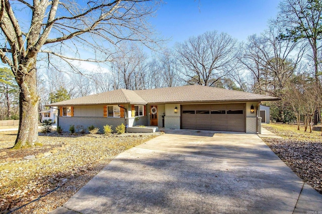 single story home featuring a garage