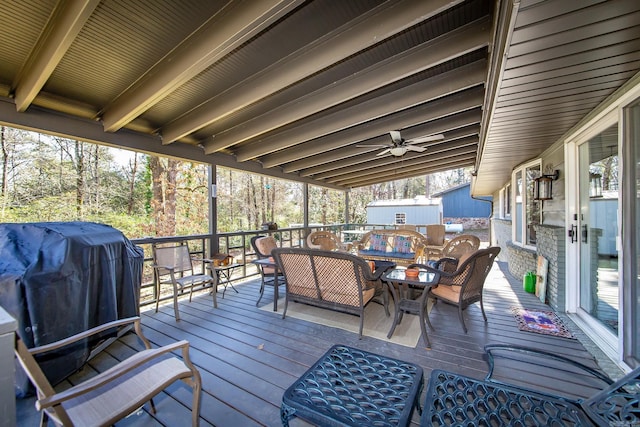 wooden deck with grilling area