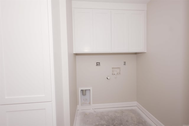 laundry area featuring cabinets, washer hookup, and hookup for an electric dryer